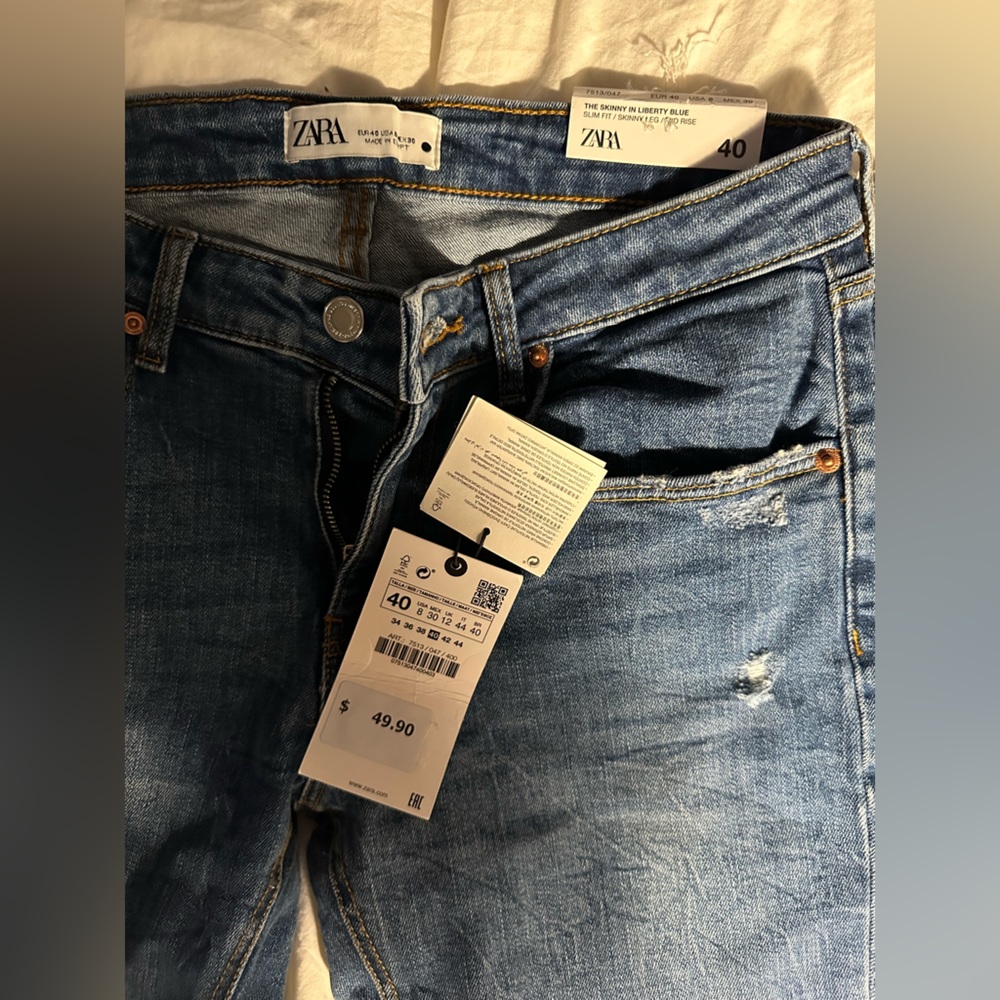 Zara - Liberty Blue Skinny Jeans with Distressed Bottoms NWT